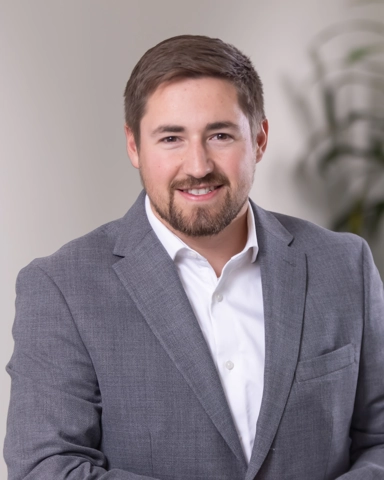 portrait of a smiling person in business attire